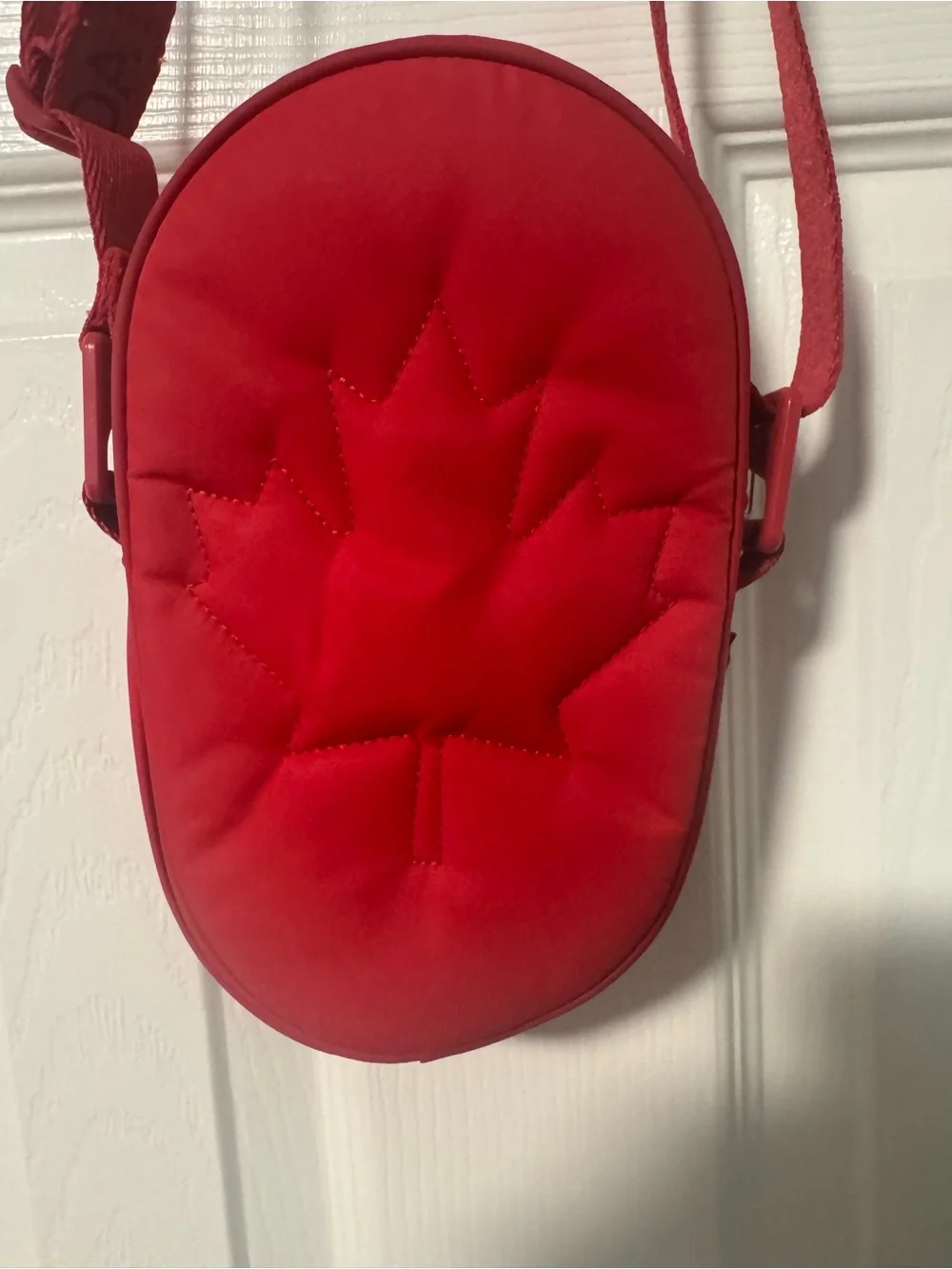 Lululemon Women’s Red Crossbody or belt bag. Zippered, outside phone pocket